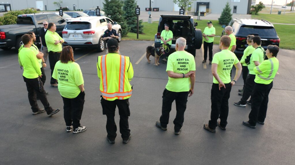 Team discussion and debrief at the staging area.