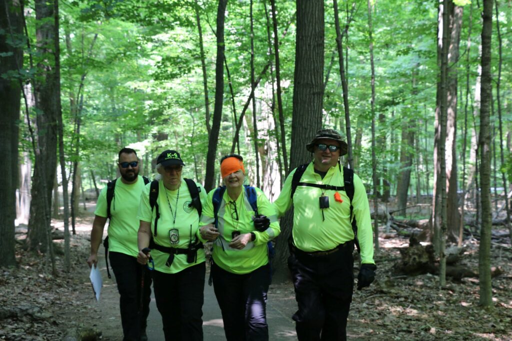 Team Alpha escorting their mock medical emergency from the field.