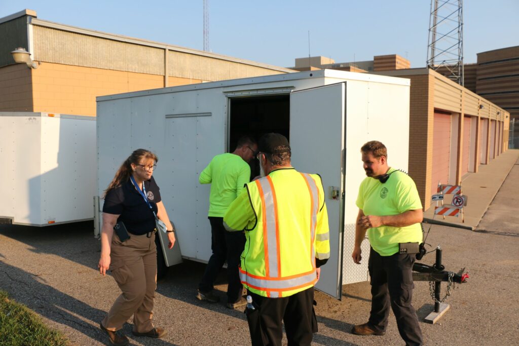 Removing gear from the SAR trailer.