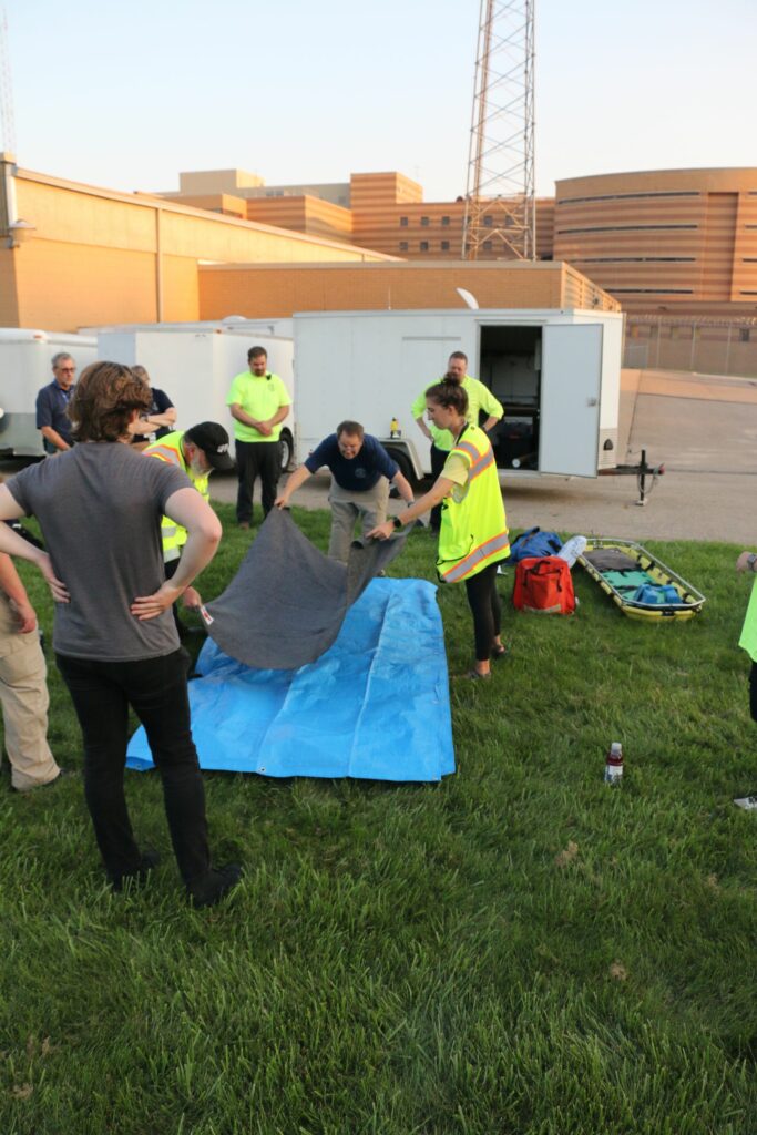 Layer 1, a tarp; layer 2, a blanket.