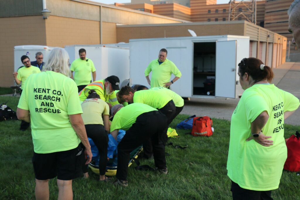 Working as a team to transfer the patient.