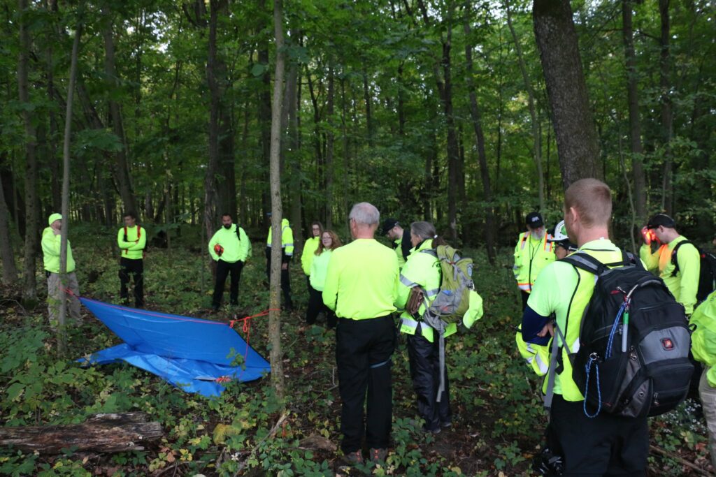 Discussing the preparation and use of a temporary shelter.