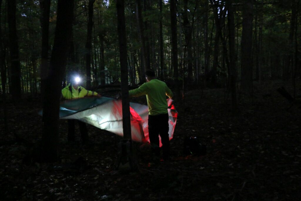 Spreading out the tarp.